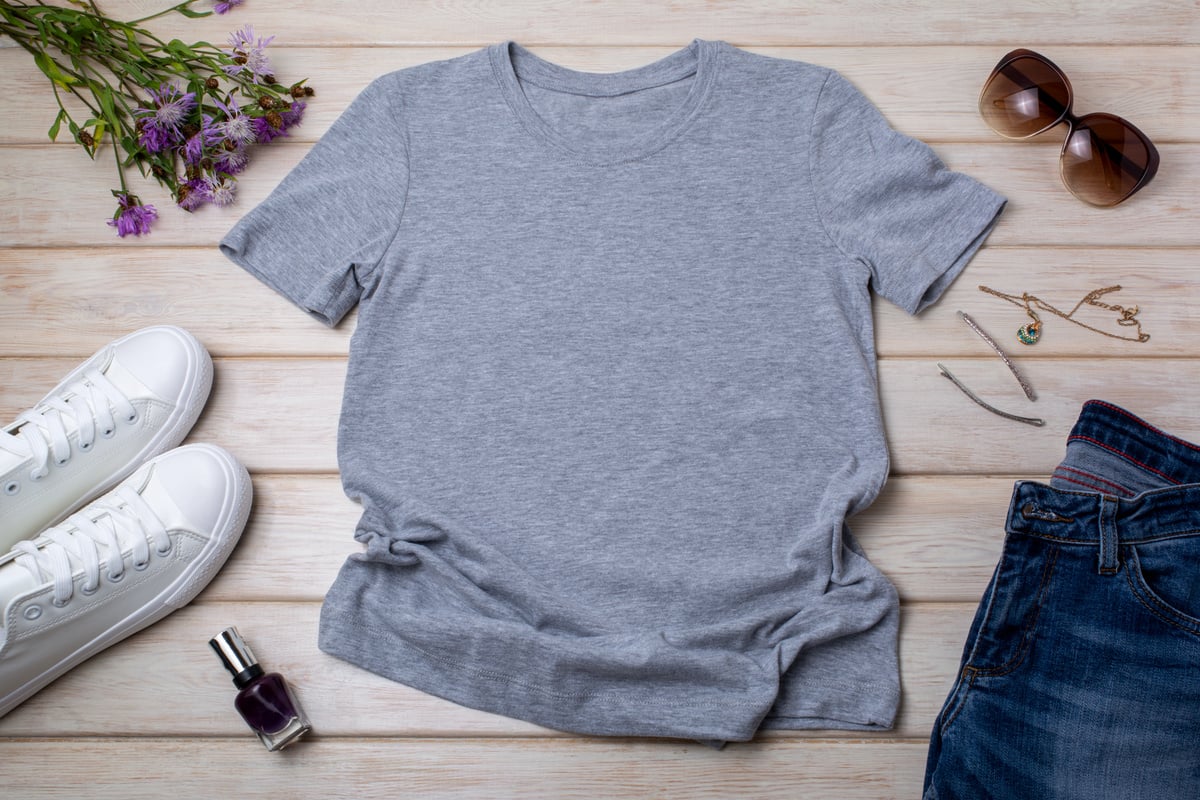 Womens gray T-shirt mockup with burdock flowers