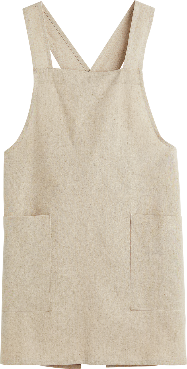 Front view of isolated beige kitchen chef apron mockup on transparent background